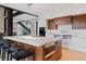 Modern kitchen island with stainless steel appliances and elegant countertops at 444 Glen Eagle Loop, Breckenridge, CO 80424