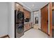 Bright laundry room showcasing modern washer and dryer units, sleek countertops, and ample storage cabinets at 444 Glen Eagle Loop, Breckenridge, CO 80424