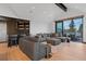 Spacious living room with bar, comfy sofa and outdoor patio at 444 Glen Eagle Loop, Breckenridge, CO 80424