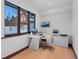 Bright home office with large windows and a modern, minimalist design at 444 Glen Eagle Loop, Breckenridge, CO 80424