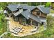 Rear exterior showcasing the patio, outdoor kitchen and lounge area at 444 Glen Eagle Loop, Breckenridge, CO 80424