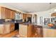 Spacious kitchen with wood cabinets, granite countertops, and stainless steel appliances at 5329 Pinyon Jay Rd, Parker, CO 80134
