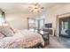 Spacious main bedroom with ceiling fan, large windows, private access to deck at 4840 Limestone Rd, Monument, CO 80132