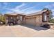 Charming home with stone accents, a two-car garage, and a cozy front porch sitting area at 7370 S Catawba Way, Aurora, CO 80016