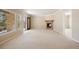 Bright living room with fireplace and large windows offers scenic views at 7370 S Catawba Way, Aurora, CO 80016