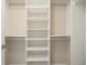 Large walk-in closet with built-in shelving and ample storage space at 7370 S Catawba Way, Aurora, CO 80016