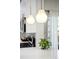 Kitchen counter with stainless steel appliances and pendant lighting at 1047 Uinta Way, Denver, CO 80230