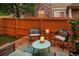 Private outdoor patio featuring a cozy seating area, perfect for relaxing and enjoying the outdoors at 1047 Uinta Way, Denver, CO 80230