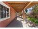 Covered patio area with stairs leading to the backyard at 11703 S Rock Willow Way, Parker, CO 80134