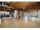 Unfinished basement with concrete floors, exposed beams and utilities at 11703 S Rock Willow Way, Parker, CO 80134