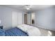 Comfortable bedroom with ensuite bathroom and closet at 11703 S Rock Willow Way, Parker, CO 80134