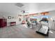 Spacious bonus room with multiple windows, a ceiling fan, and ample space for various activities at 11703 S Rock Willow Way, Parker, CO 80134