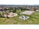 Community park featuring a playground, basketball court, and covered picnic area at 11703 S Rock Willow Way, Parker, CO 80134