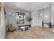 Inviting living room with hardwood floors, stylish decor, and plenty of natural light at 11703 S Rock Willow Way, Parker, CO 80134
