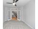 Versatile room with french doors and neutral carpet, offering flexible space for a home office or den at 11703 S Rock Willow Way, Parker, CO 80134