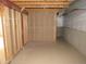 Unfinished basement showing framing and concrete floor at 21444 E Lehigh Ave, Aurora, CO 80013