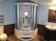 Compact bathroom showcasing a shower stall, toilet, and vanity at 21444 E Lehigh Ave, Aurora, CO 80013