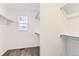 Walk-in closet with shelves and racks at 587 Nightsky St, Erie, CO 80516