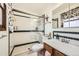 Well-lit bathroom featuring a glass-enclosed shower and updated fixtures for a clean, modern look at 710 S Grand Ave, Fort Lupton, CO 80621