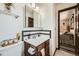 Bathroom view showcasing vanity, sink, and mirror at 710 S Grand Ave, Fort Lupton, CO 80621