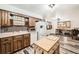 Spacious kitchen featuring ample cabinetry, modern appliances, and great natural light at 710 S Grand Ave, Fort Lupton, CO 80621