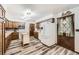 Bright kitchen featuring updated appliances, stylish cabinetry, and a convenient kitchen island at 710 S Grand Ave, Fort Lupton, CO 80621
