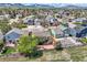 Neighborhood aerial with a backyard featuring a cozy patio perfect for outdoor entertaining at 5400 S Quail Way, Littleton, CO 80127