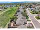 Picturesque neighborhood aerial view near green space and lake, surrounded by mature trees at 5400 S Quail Way, Littleton, CO 80127