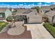 Charming single-Gathering home with a well-manicured front yard and attached two-car garage at 5400 S Quail Way, Littleton, CO 80127