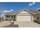 Charming single-story home with a two-car garage, inviting front porch, and easy-to-maintain landscaping at 5400 S Quail Way, Littleton, CO 80127