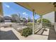 Cozy covered porch that offers a relaxing view of the neighborhood at 5400 S Quail Way, Littleton, CO 80127