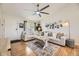 Open-concept living area with vaulted ceilings and modern décor, ideal for comfortable and stylish living at 5400 S Quail Way, Littleton, CO 80127