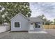 Charming cottage-style house with a well-manicured yard and inviting front entrance at 6880 Pontiac St, Commerce City, CO 80022