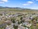 Aerial view captures the community in a serene mountain setting at 19093 W 61St Pl, Golden, CO 80403