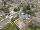 Birds eye view of home with fire pit, solar panels, yard and white fence at 19093 W 61St Pl, Golden, CO 80403