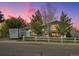 Charming two-story home with well-manicured lawn and white picket fence at 19093 W 61St Pl, Golden, CO 80403