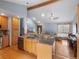 Open concept kitchen area featuring wood cabinets, granite counters, and stainless steel appliances at 19093 W 61St Pl, Golden, CO 80403
