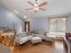 Bright living room showcasing hardwood floors, comfortable seating, and natural light at 19093 W 61St Pl, Golden, CO 80403