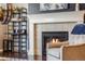 Cozy living room with fireplace, comfortable seating, and stylish decor at 12677 Fisher Dr, Englewood, CO 80112