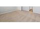 Bright and airy bedroom with neutral carpet and open doorway at 2125 Alyssa St, Fort Lupton, CO 80621