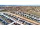 A high-definition aerial view of a residential community, showcasing the landscape at 6066 Leilani Dr, Castle Rock, CO 80108
