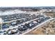 A high-definition aerial view of a residential community, showcasing the landscape in winter at 6066 Leilani Dr, Castle Rock, CO 80108