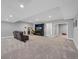 Finished basement with a TV, seating, and recreational space at 6066 Leilani Dr, Castle Rock, CO 80108