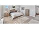 Bedroom with large windows, carpeted floor and light walls at 6066 Leilani Dr, Castle Rock, CO 80108