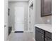 Entryway with tile flooring, bench, and access to storage at 6066 Leilani Dr, Castle Rock, CO 80108