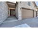 Beautiful front entrance with stone facade and covered porch at 6066 Leilani Dr, Castle Rock, CO 80108