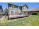 Large backyard with a spacious deck, perfect for entertaining and enjoying the outdoors at 26764 E Canyon Ave, Aurora, CO 80016