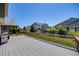 Large backyard deck overlooking a well-maintained yard and neighboring houses at 26764 E Canyon Ave, Aurora, CO 80016
