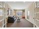 Versatile bonus room with ample space, stylish decor, and natural light at 26764 E Canyon Ave, Aurora, CO 80016