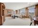 This living room features neutral decor, open floor plan, and work space at 26764 E Canyon Ave, Aurora, CO 80016